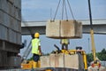 Construction workers stacking the maintain load test block at the construction site Royalty Free Stock Photo